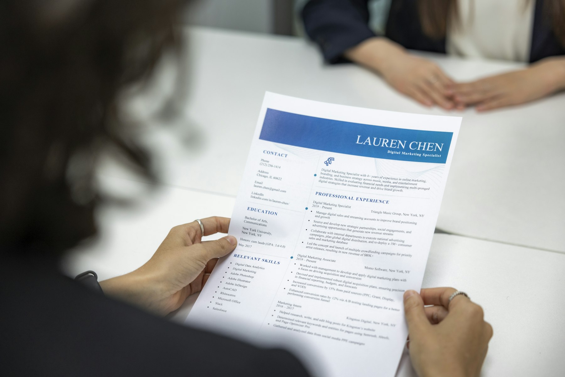 A candidate's resume being reviewed in an interview
